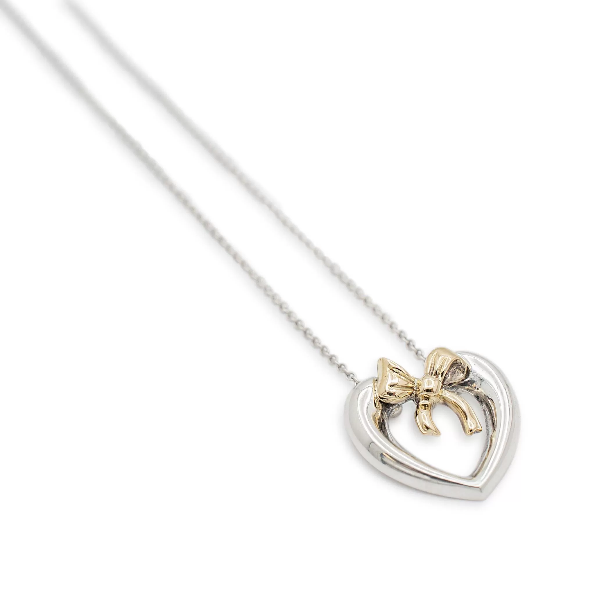 Ladies Tiffany & Co. 925 Sterling Silver & 14K Yellow Gold Bow Ribbon Heart Pendant Necklace